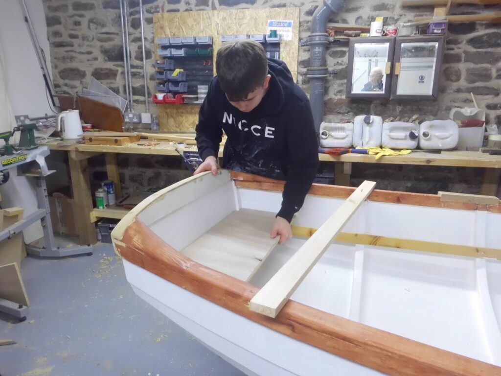 Banff Academy pupils boat building at Cullen Sea School workshop