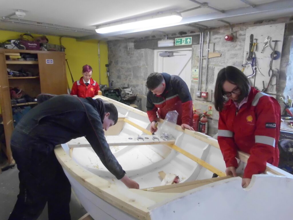Banff Academy pupils boat building at Cullen Sea School workshop