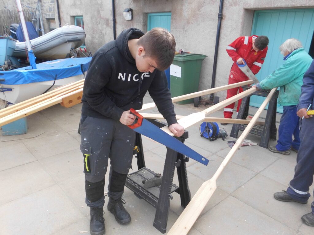 Banff Academy pupils boat building at Cullen Sea School workshop