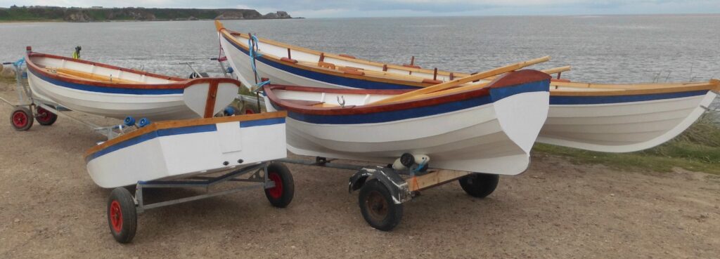Image of boats built by Banff Academy Students at Cullen Sea School